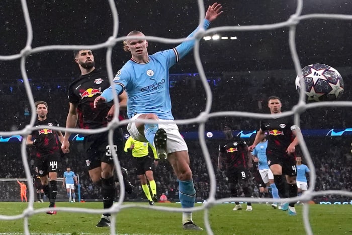 Erling Haaland pictured scoring one of his FIVE goals during Manchester City's 7-0 win over RB Leipzig in March 2023